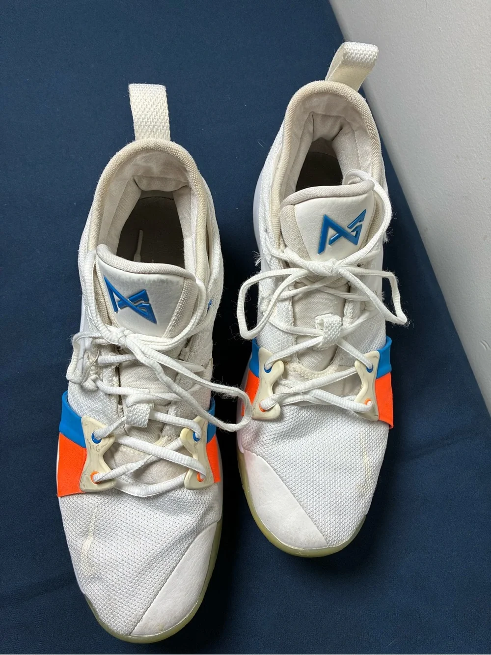 Nike White Youth Athletic Sneakers with Blue & Orange Accents